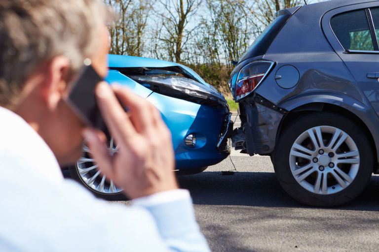 car accident man on phone